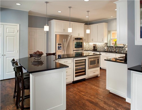  Black Granite Kitchen Countertops Subway Tile Backsplash Light Wood Floor White Recessed Panel Cabinets Black Countertop Island Countertop Kitchen Cabinets